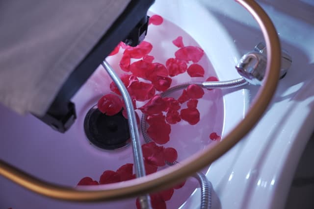 Treatment basin with rose petals